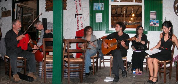 Some members of The Famous SOAS Rebetiko Band getting ready. Two pictures, stitched with AutoStitch.