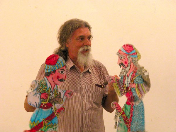 Jason Melissinos and two of his shadow puppets